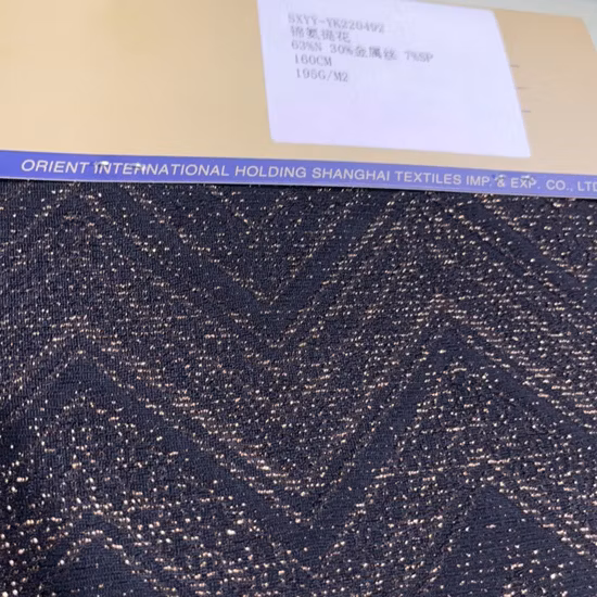 Tessuto in maglia jacquard premium con filo metallico